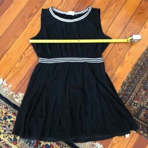 Black flared dress with stripe accents